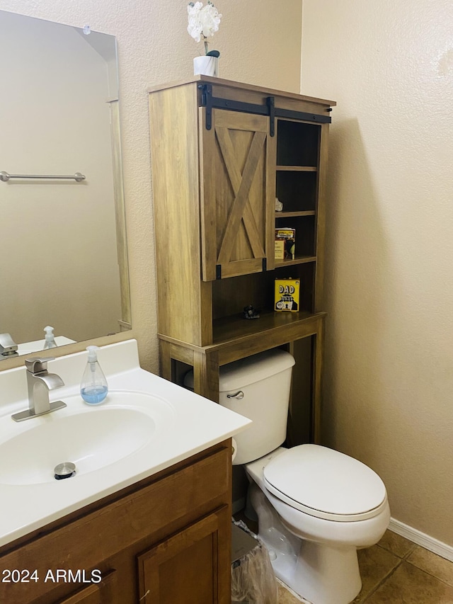 5881 E Sunrise Cir, Florence, AZ 85132 - half bath with baseboards, toilet, tile patterned flooring, and vanity