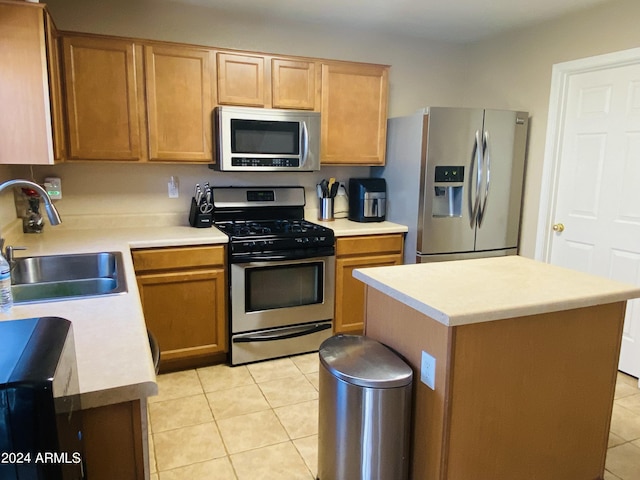 5881 E Sunrise Cir, Florence, AZ 85132 - kitchen with light tile patterned floors, light countertops, a sink, and stainless steel appliances