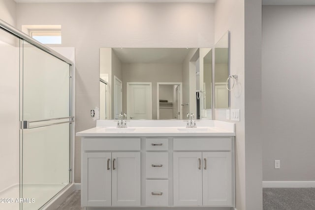 17032 W Cavedale Dr, Surprise, AZ 85387 - bathroom featuring a shower stall and double vanity