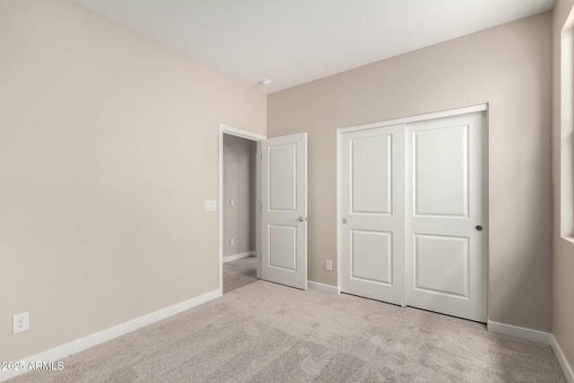 17032 W Cavedale Dr, Surprise, AZ 85387 - unfurnished bedroom with carpet and a closet