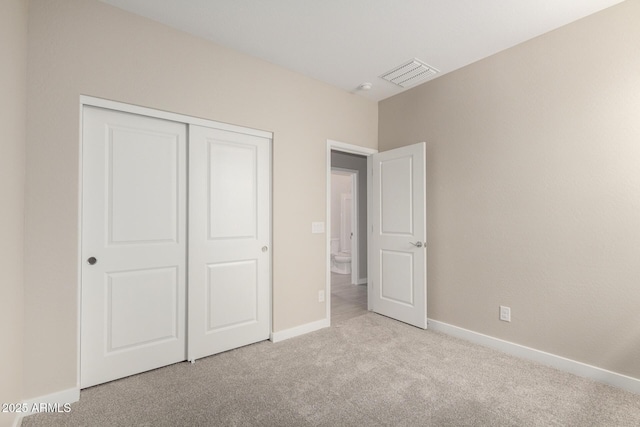 17032 W Cavedale Dr, Surprise, AZ 85387 - unfurnished bedroom with carpet and a closet