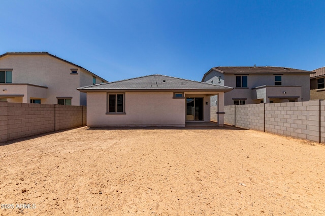17032 W Cavedale Dr, Surprise, AZ 85387 - back of house with a fenced backyard