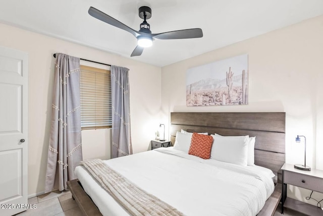 16436 N 64th Pl, Scottsdale, AZ 85254 - tiled bedroom with a ceiling fan