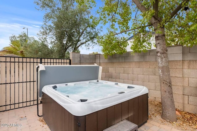 16436 N 64th Pl, Scottsdale, AZ 85254 - view of patio / terrace with a hot tub and fence