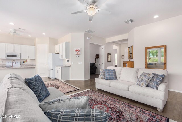 dining room featuring a chandelier, hardwood / wood-style floors, and a wealth of natural light