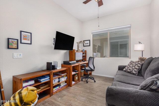 office featuring ceiling fan and light hardwood / wood-style flooring