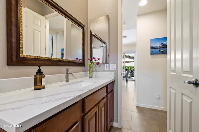 14037 E Coyote Rd, Scottsdale, AZ 85259 - bathroom featuring baseboards and vanity
