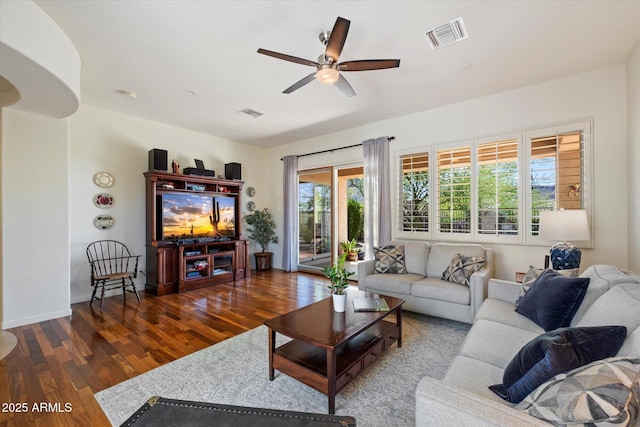 14037 E Coyote Rd, Scottsdale, AZ 85259 - living room featuring visible vents, baseboards, a ceiling fan, and wood finished floors