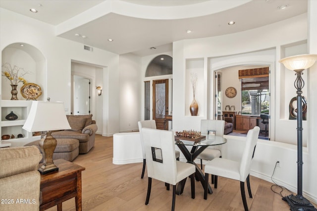 dining room with light wood-type flooring