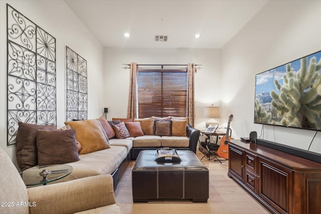 living room with light hardwood / wood-style floors