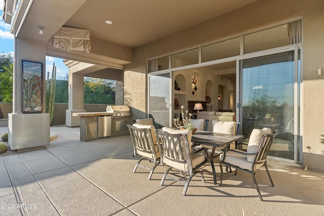 view of patio / terrace with exterior kitchen