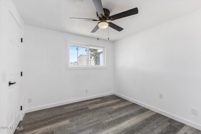 118 S 700th St E, Taylor, AZ 85939 - empty room with dark wood finished floors, a ceiling fan, and baseboards