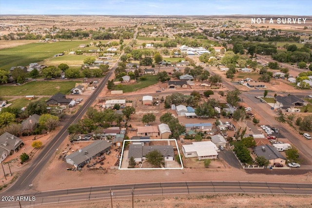 118 S 700th St E, Taylor, AZ 85939 - aerial overview of property's location featuring property boundaries highlighted and nearby suburban area