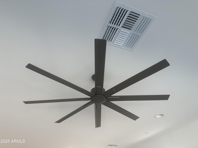 room details with visible vents and a ceiling fan