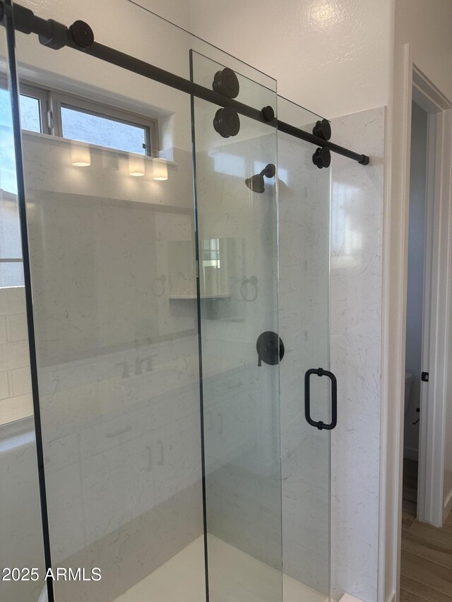 full bathroom with a stall shower