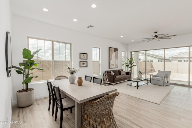 dining space with recessed lighting, visible vents, ceiling fan, and light wood-type flooring