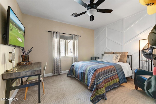 bedroom with baseboards, a ceiling fan, carpet flooring, and visible vents