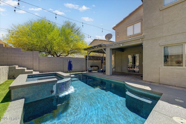 view of pool featuring a fenced backyard, a patio area, and a pool with connected hot tub