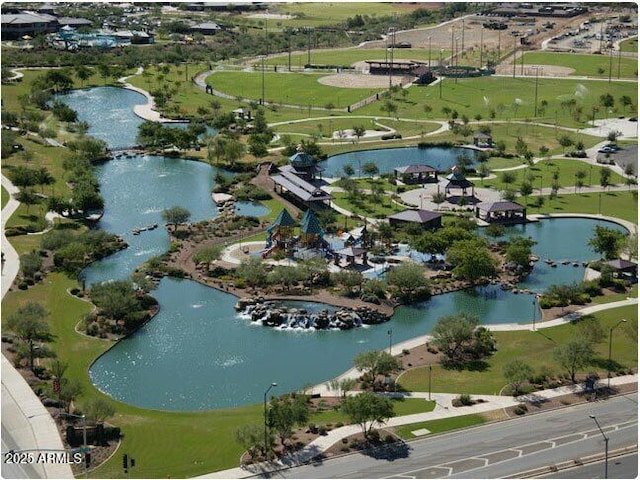 birds eye view of property with a water view