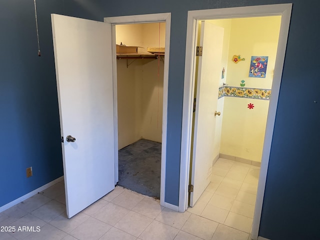 3115 N 26th St, Phoenix, AZ 85016 - unfurnished bedroom featuring a closet and light tile patterned flooring
