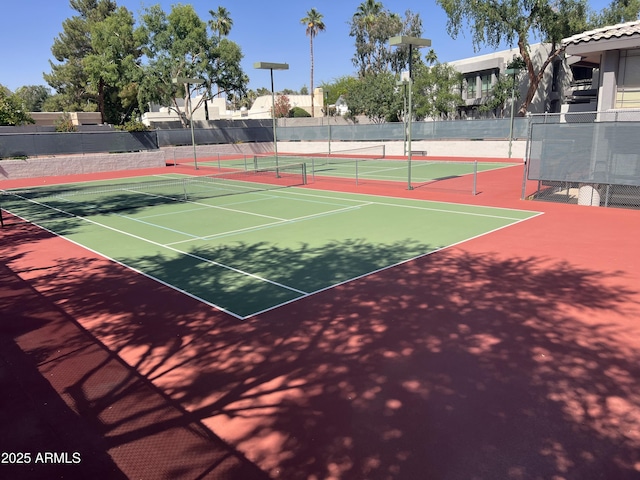 5203 N 24th St Unit 207, Phoenix, AZ 85016 - view of tennis court featuring community basketball court