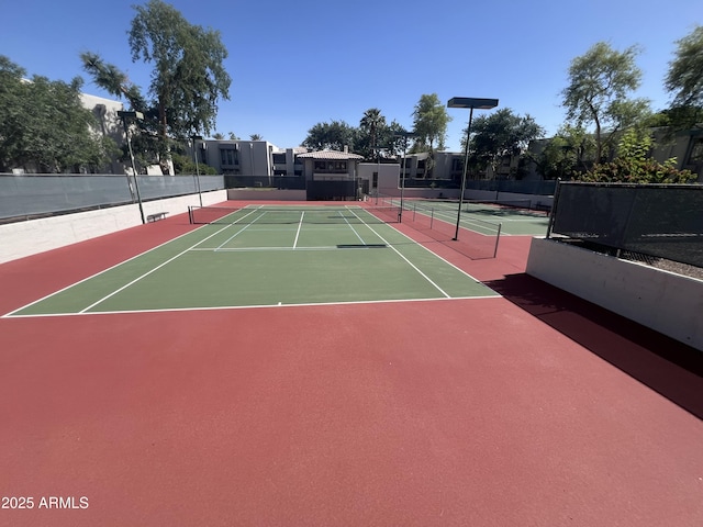5203 N 24th St Unit 207, Phoenix, AZ 85016 - view of tennis court with community basketball court