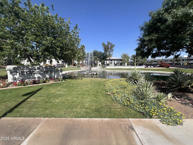 5203 N 24th St Unit 207, Phoenix, AZ 85016 - view of grassy yard featuring a water view