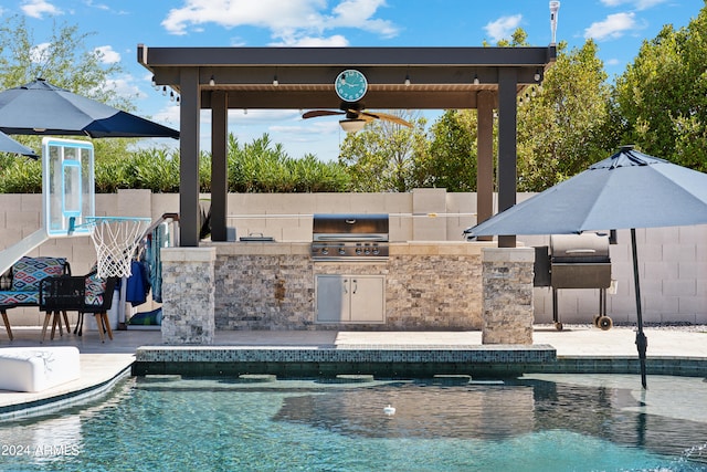 view of swimming pool with ceiling fan, a grill, and area for grilling