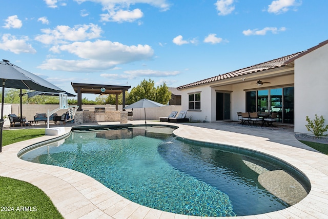 view of swimming pool with a patio area