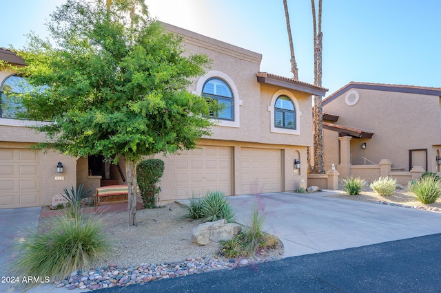 view of front of property with a garage