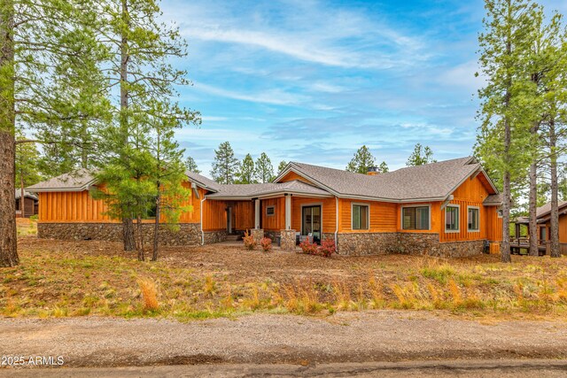 3441 S Del Aire Ct Unit 182, Flagstaff, AZ 86005 - view of front of home with covered porch and stone siding