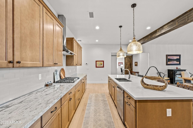 3441 S Del Aire Ct Unit 182, Flagstaff, AZ 86005 - kitchen featuring appliances with stainless steel finishes, light wood-style flooring, a sink, decorative backsplash, and baseboards