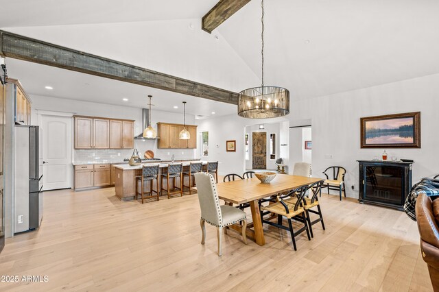3441 S Del Aire Ct Unit 182, Flagstaff, AZ 86005 - dining space with beamed ceiling, light wood-style flooring, recessed lighting, a chandelier, and high vaulted ceiling