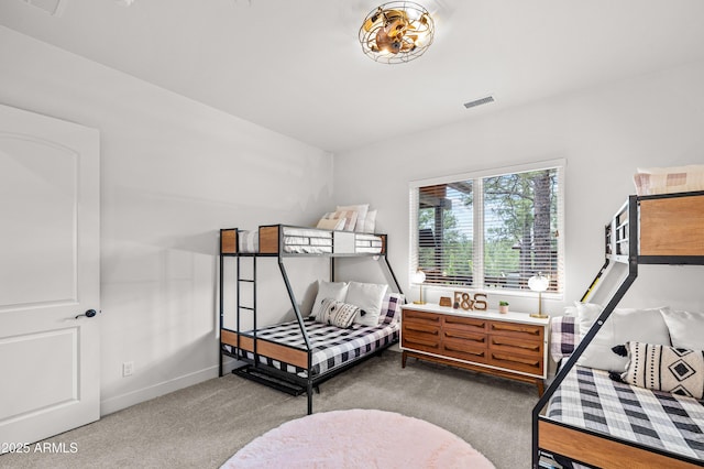 3441 S Del Aire Ct Unit 182, Flagstaff, AZ 86005 - carpeted bedroom featuring baseboards