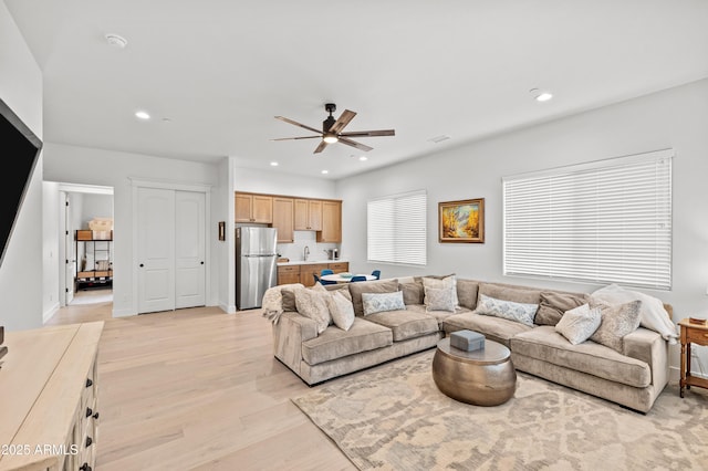 3441 S Del Aire Ct Unit 182, Flagstaff, AZ 86005 - living area with a ceiling fan, light wood finished floors, recessed lighting, and baseboards