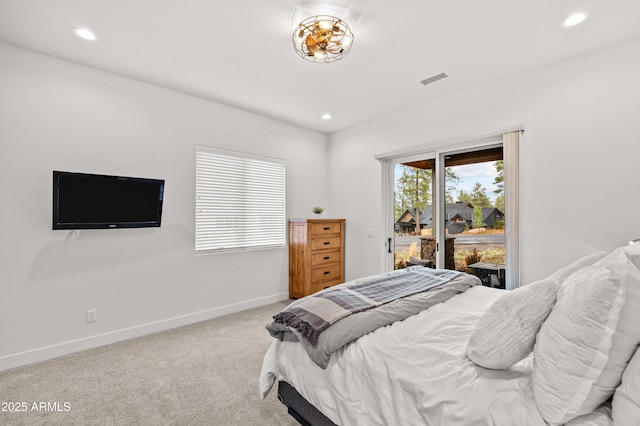 3441 S Del Aire Ct Unit 182, Flagstaff, AZ 86005 - bedroom with access to outside, recessed lighting, carpet flooring, and baseboards