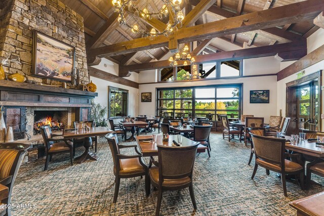 3441 S Del Aire Ct Unit 182, Flagstaff, AZ 86005 - dining space featuring a chandelier, high vaulted ceiling, wood ceiling with exposed beams, and plenty of natural light