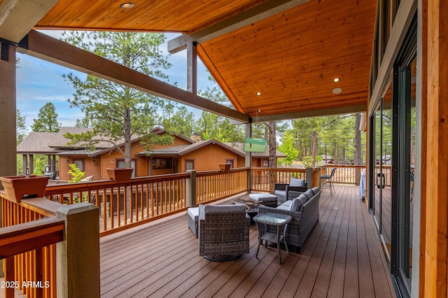 3441 S Del Aire Ct Unit 182, Flagstaff, AZ 86005 - wooden terrace with an outdoor living space
