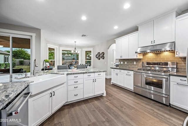 kitchen with sink, white cabinetry, and stainless steel appliances