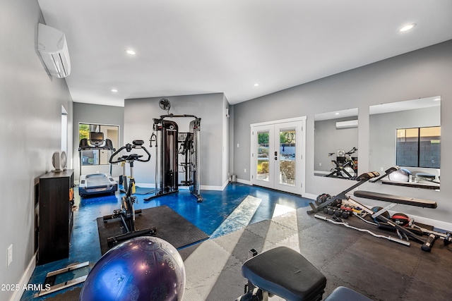 exercise room with french doors and an AC wall unit