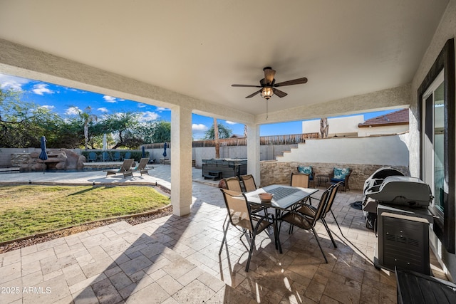 view of patio / terrace featuring grilling area and ceiling fan