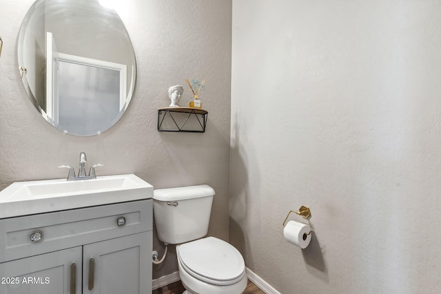2237 S Jacana Ln, Gilbert, AZ 85295 - bathroom featuring toilet, vanity, and a textured wall