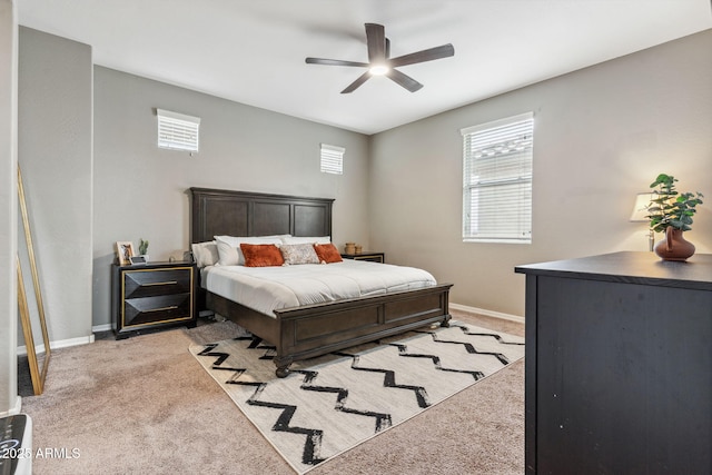 2237 S Jacana Ln, Gilbert, AZ 85295 - bedroom with light colored carpet, baseboards, and a ceiling fan