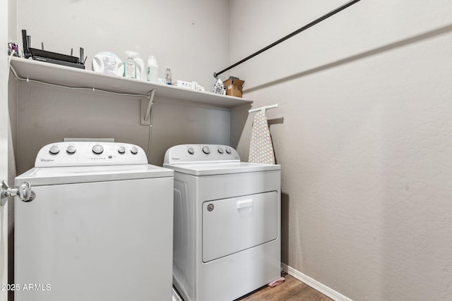 2237 S Jacana Ln, Gilbert, AZ 85295 - laundry room with washing machine and dryer, light wood-style flooring, and baseboards