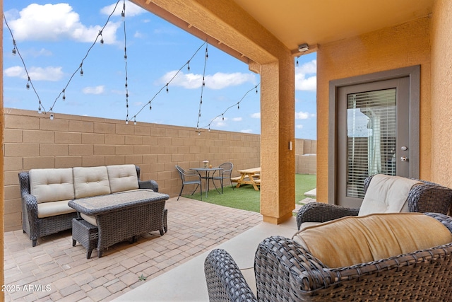 2237 S Jacana Ln, Gilbert, AZ 85295 - fenced backyard with a patio and an outdoor hangout area