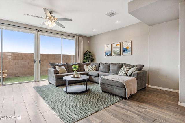 2237 S Jacana Ln, Gilbert, AZ 85295 - living room featuring a ceiling fan, wood finished floors, baseboards, and recessed lighting