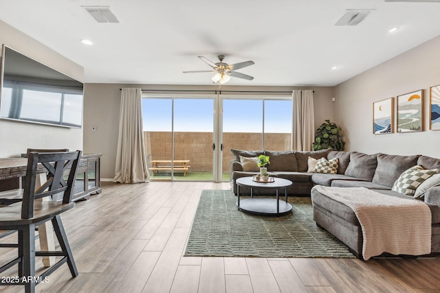 2237 S Jacana Ln, Gilbert, AZ 85295 - living room with ceiling fan and wood finished floors