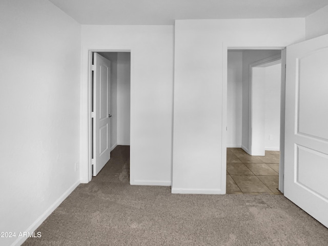 spare room featuring carpet flooring