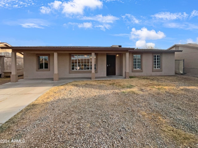 ranch-style house featuring a patio area