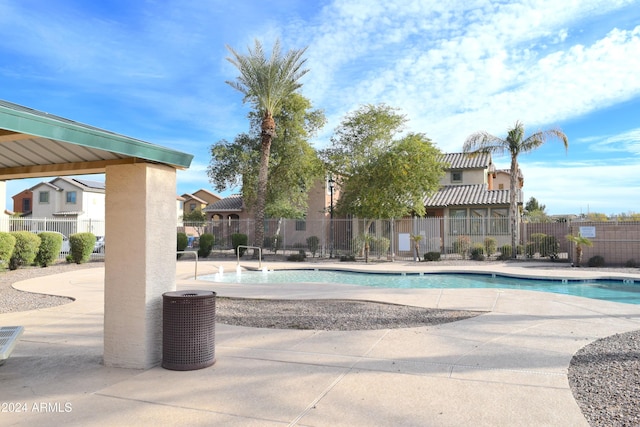 view of pool featuring a patio